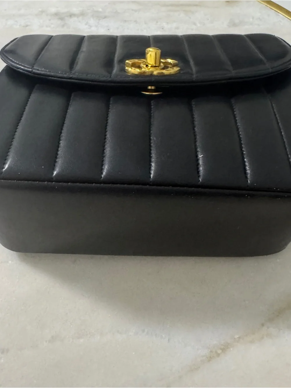 CHANEL Black Vertical Quilted Lambskin Shoulder Bag with Gold Hardware